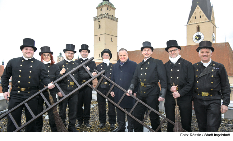 Kaminkehrer überbringen Neujahrswünsche